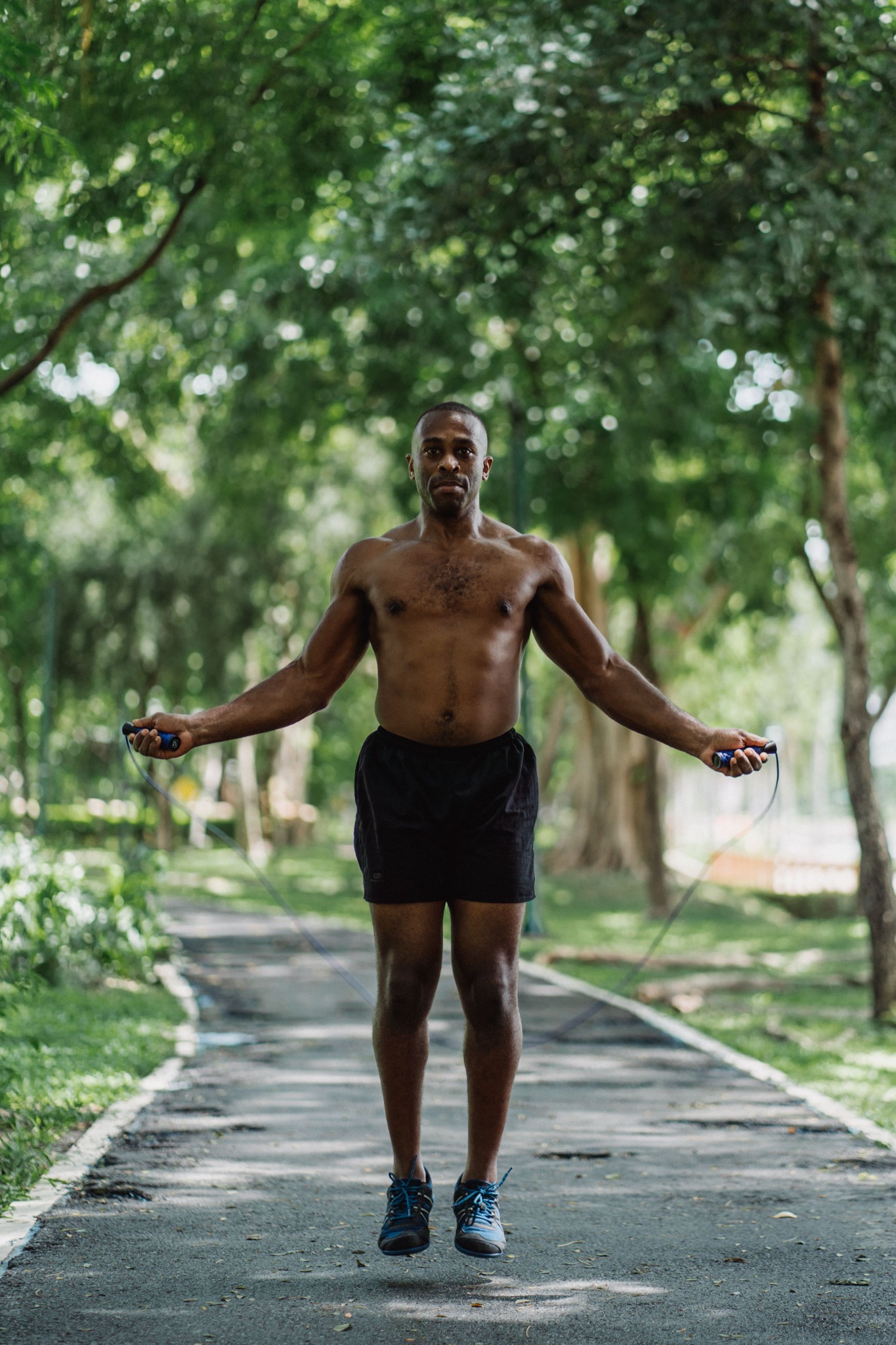 Athlete jumping rope outdoors